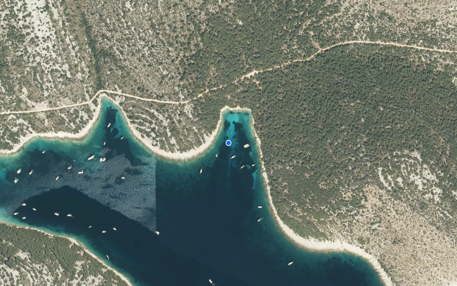 Satellite and nautical chart view of birthday bay
