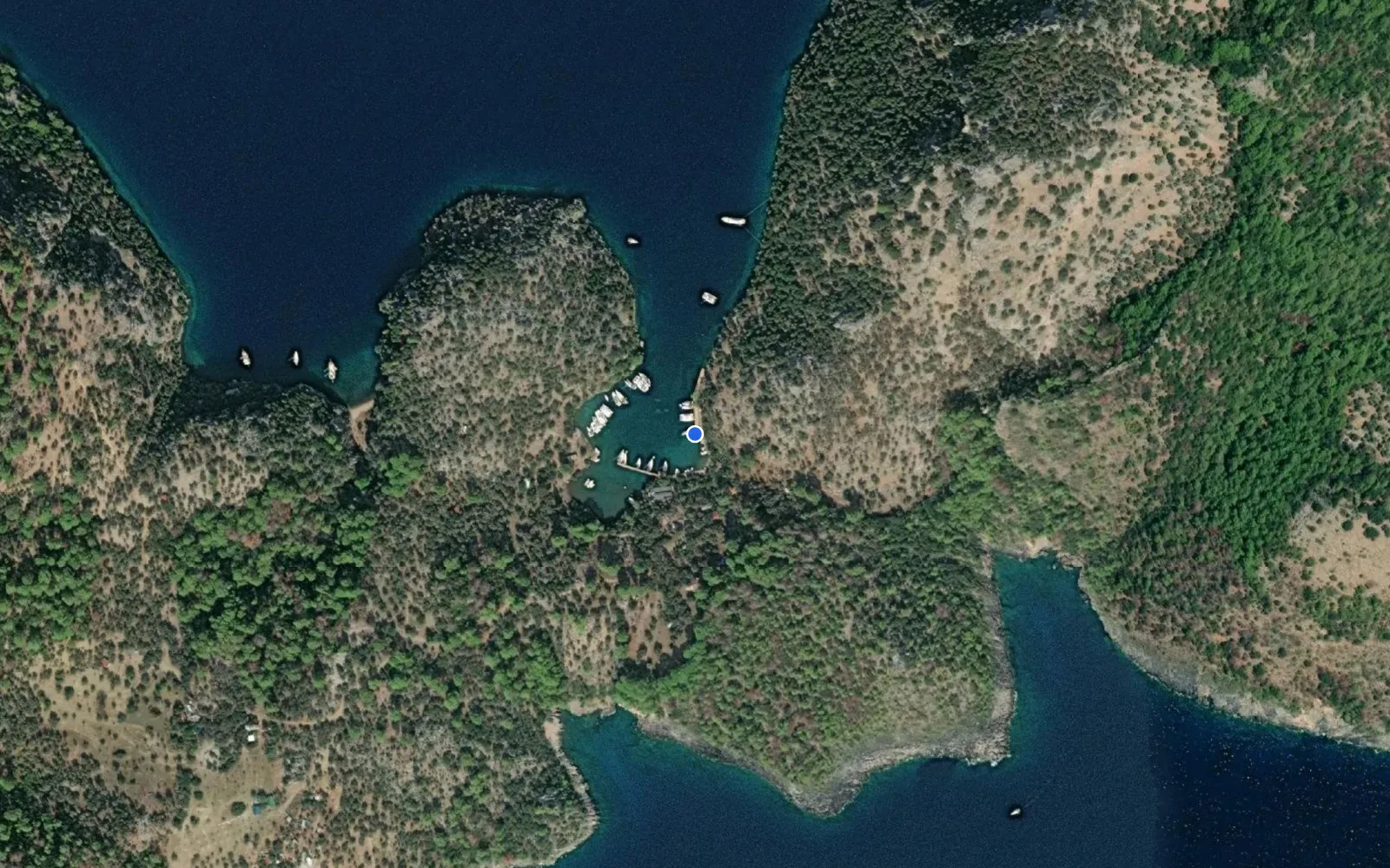 Satellite and nautical chart view of Kapi Creek private marina