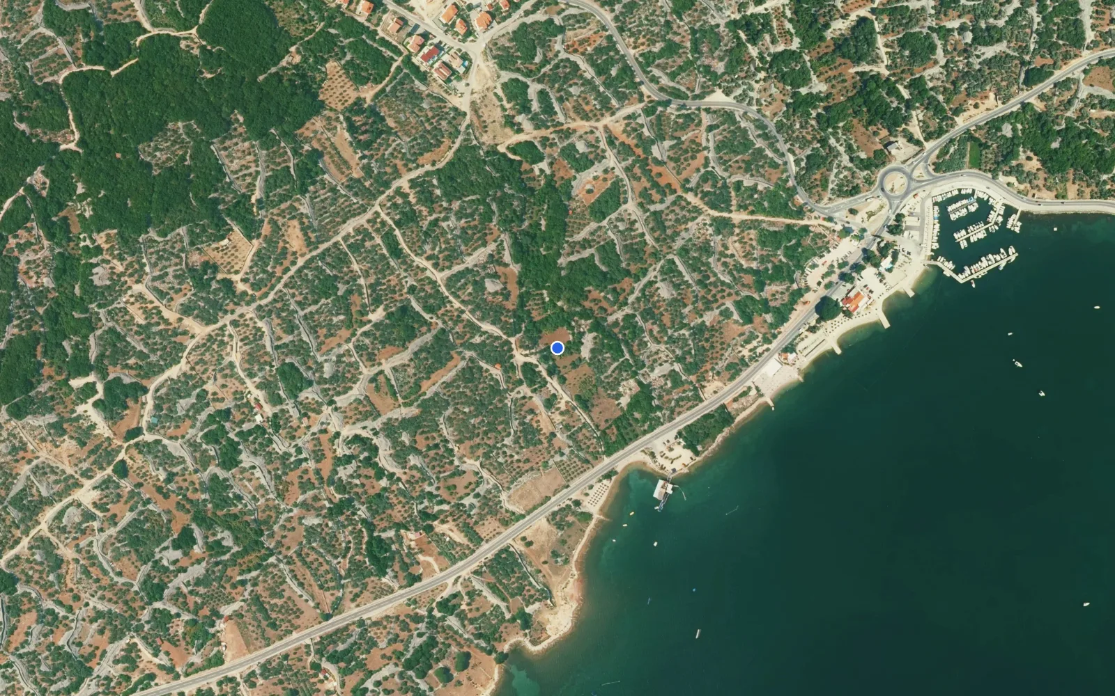 Satellite and nautical chart view of Kornic Harbour