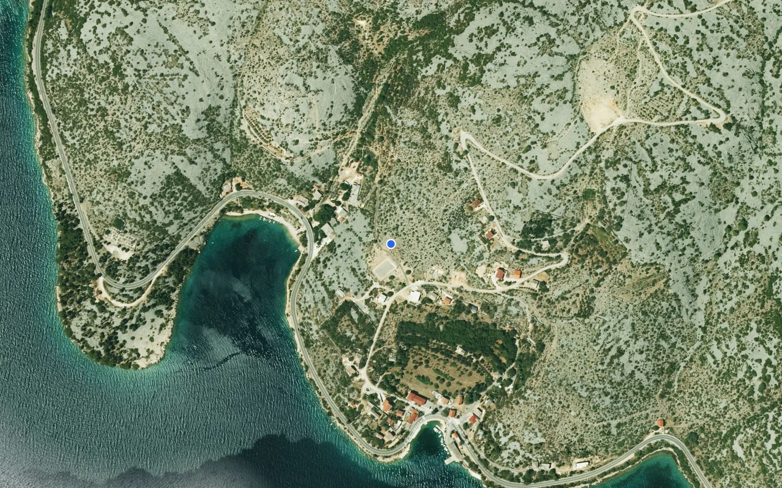 Satellite and nautical chart view of Kruscica Harbour