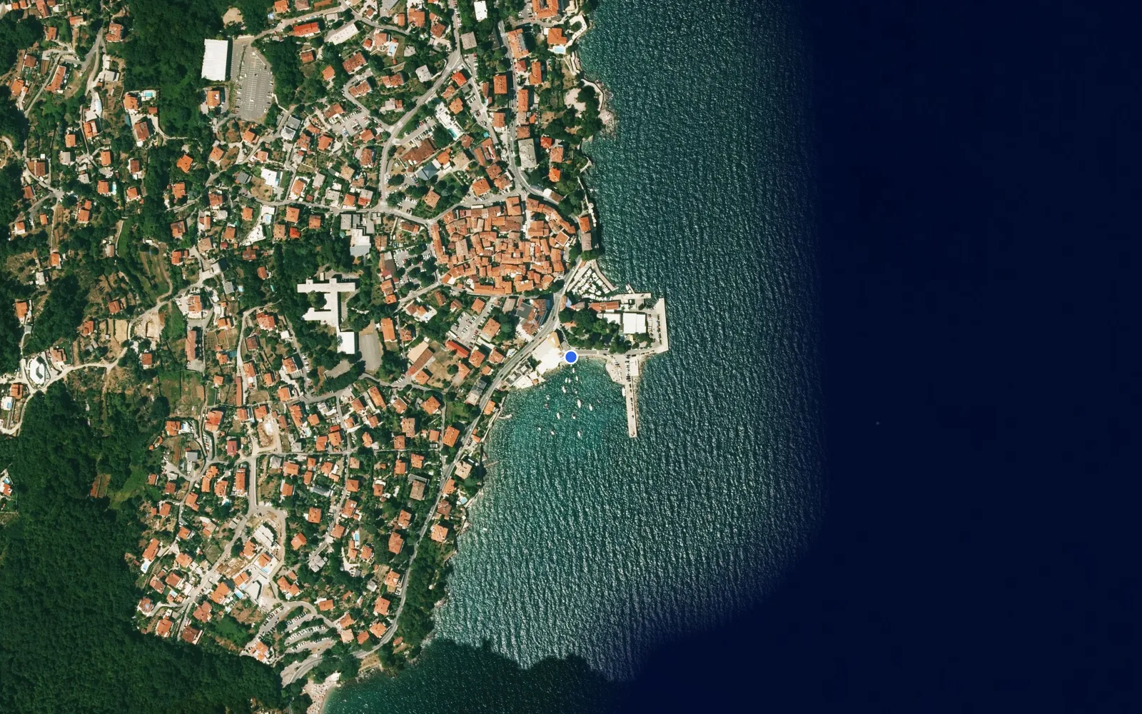 Satellite and nautical chart view of Lovran Harbour