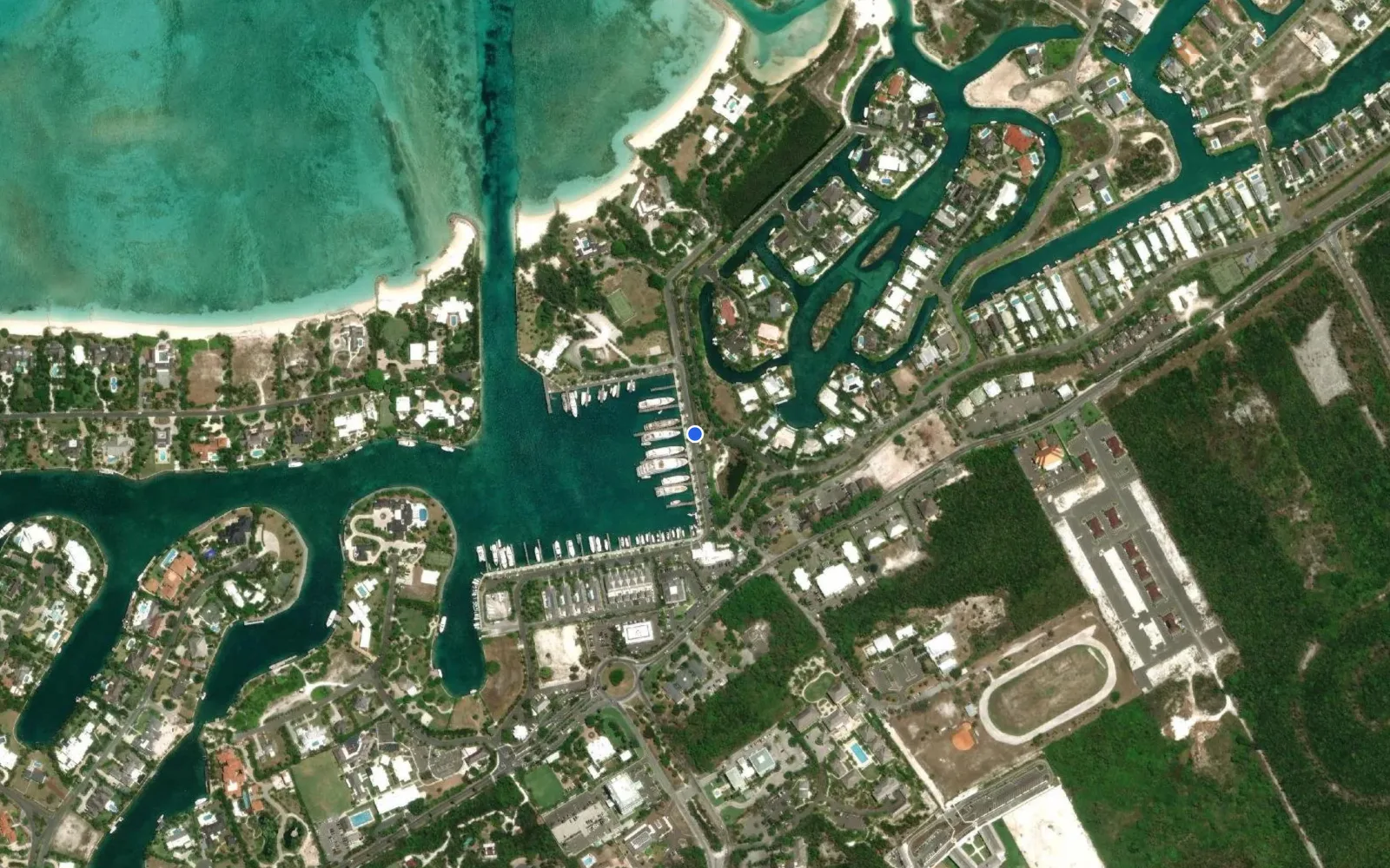 Satellite and nautical chart view of Lyford Cay Club Marina
