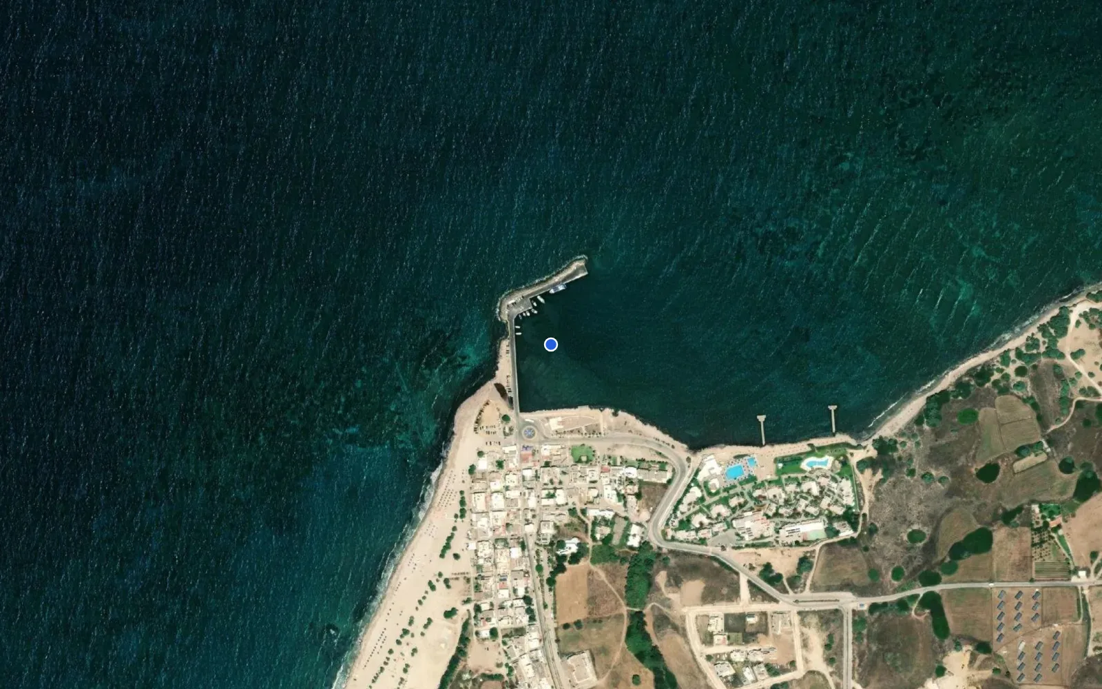 Satellite and nautical chart view of Mastichari Harbour