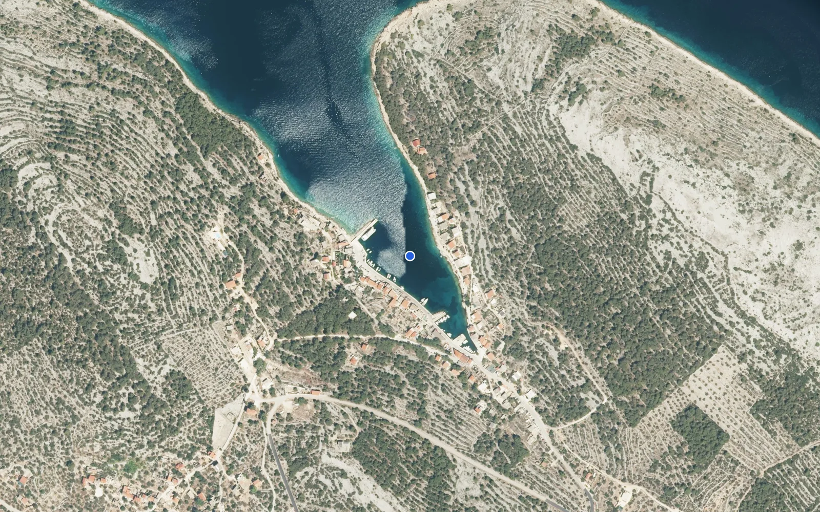 Satellite and nautical chart view of Muna