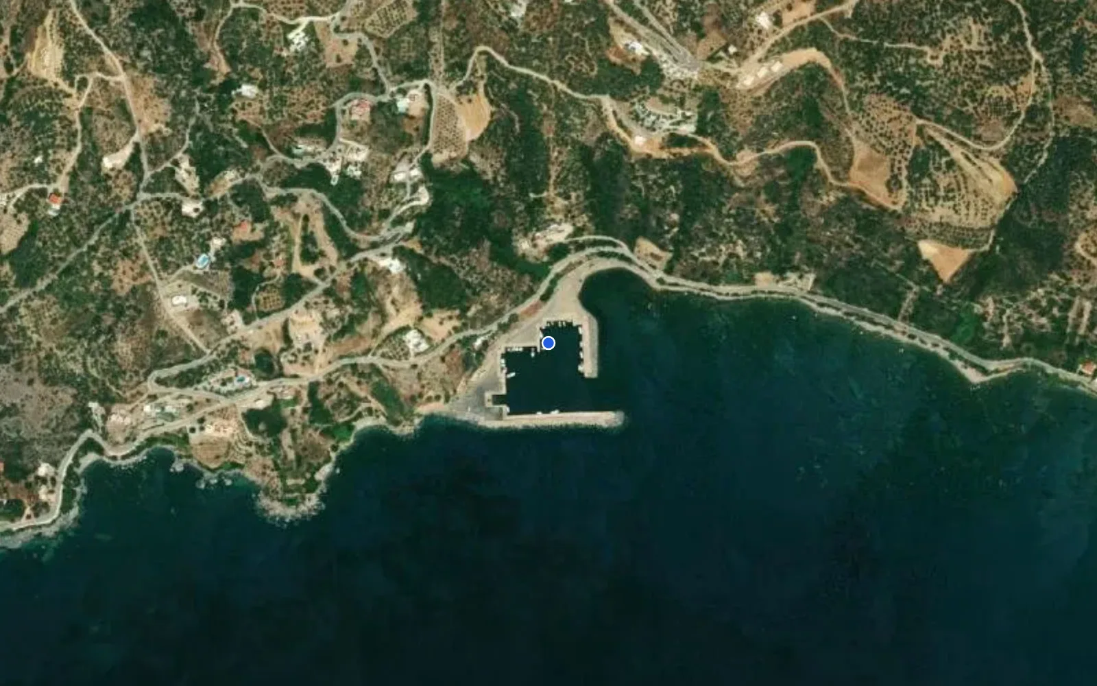 Satellite and nautical chart view of New Harbour Plakias