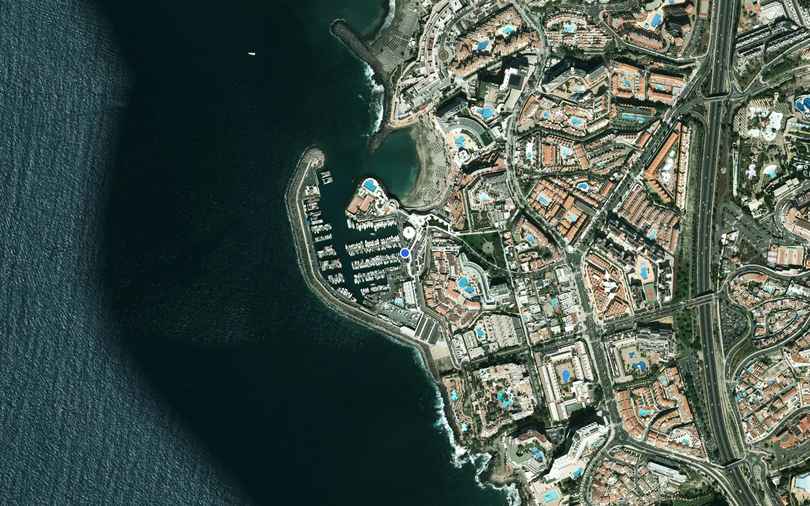 Satellite and nautical chart view of Puerto Colon