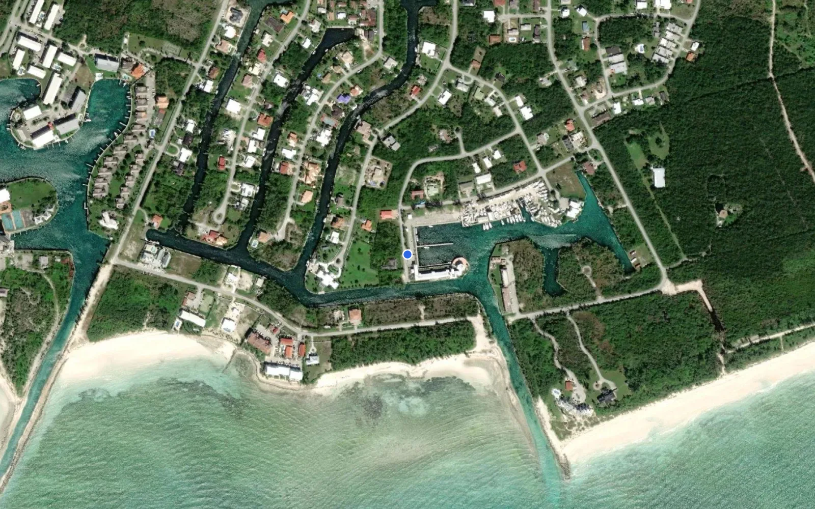 Satellite and nautical chart view of The Xquisite Catamaran Center (formerly Running Mon Marina)