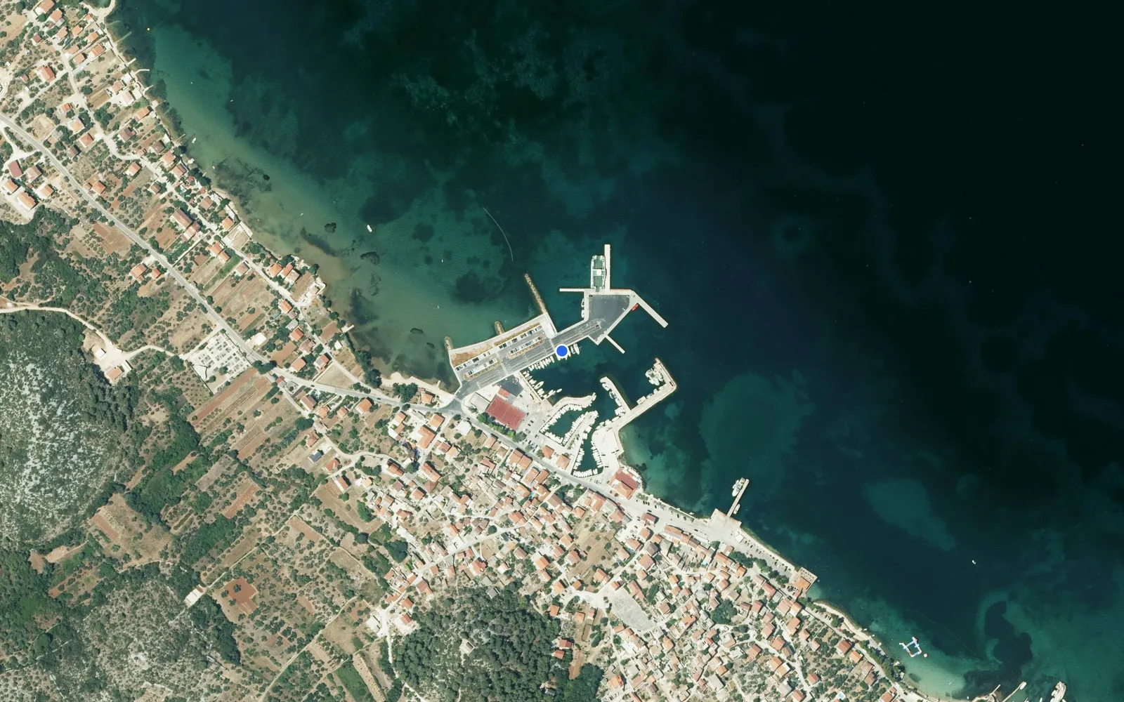 Satellite and nautical chart view of Tkon harbour