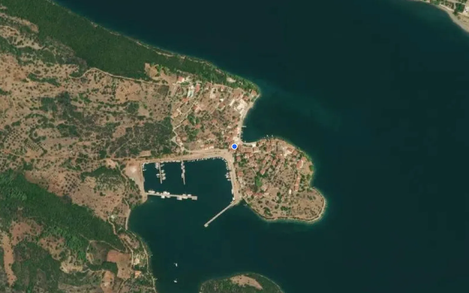 Satellite and nautical chart view of Trizonia Marina