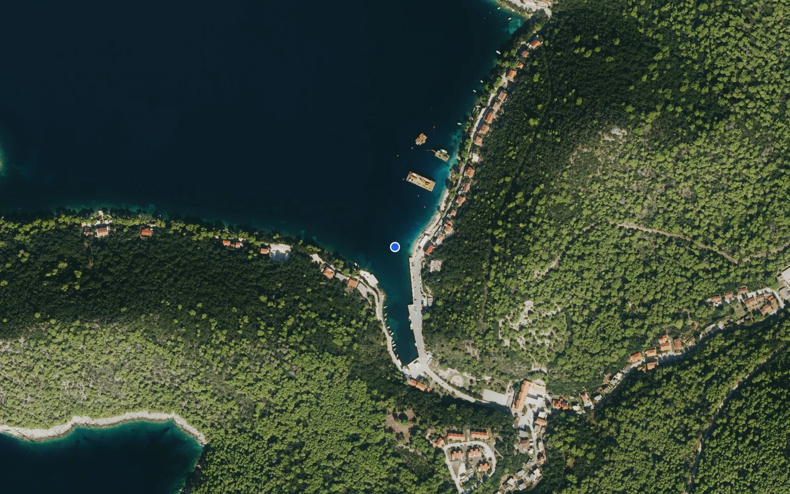 Satellite and nautical chart view of Ubli